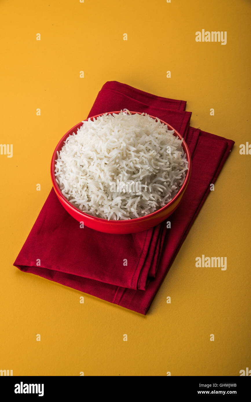basmati rice in a brass bowl, cooked basmati rice, cooked plain rice