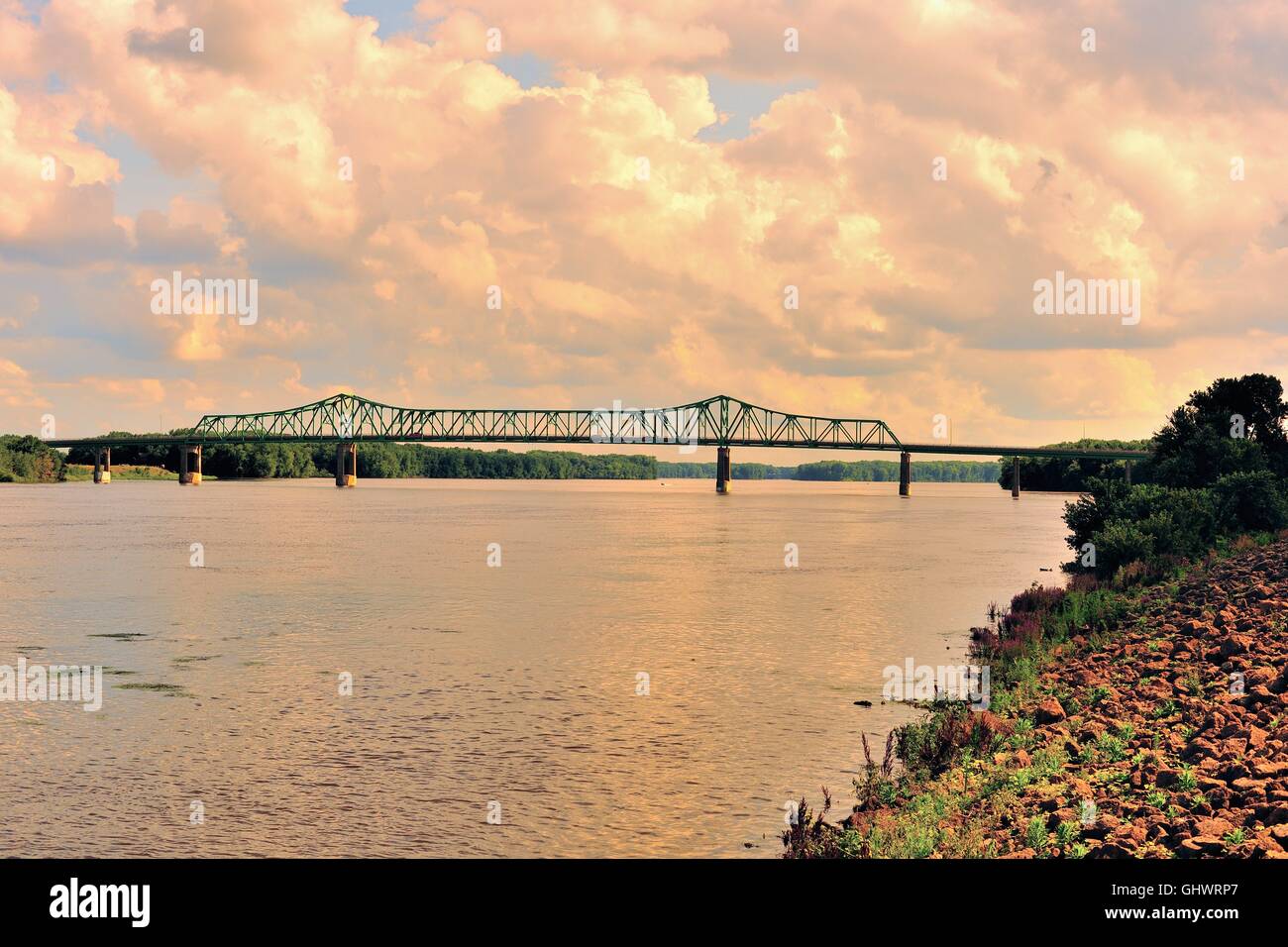 A highway bridge linking Illinois and Iowa over a western channel of the Mississippi River at Clinton, Iowa, USA. Stock Photo