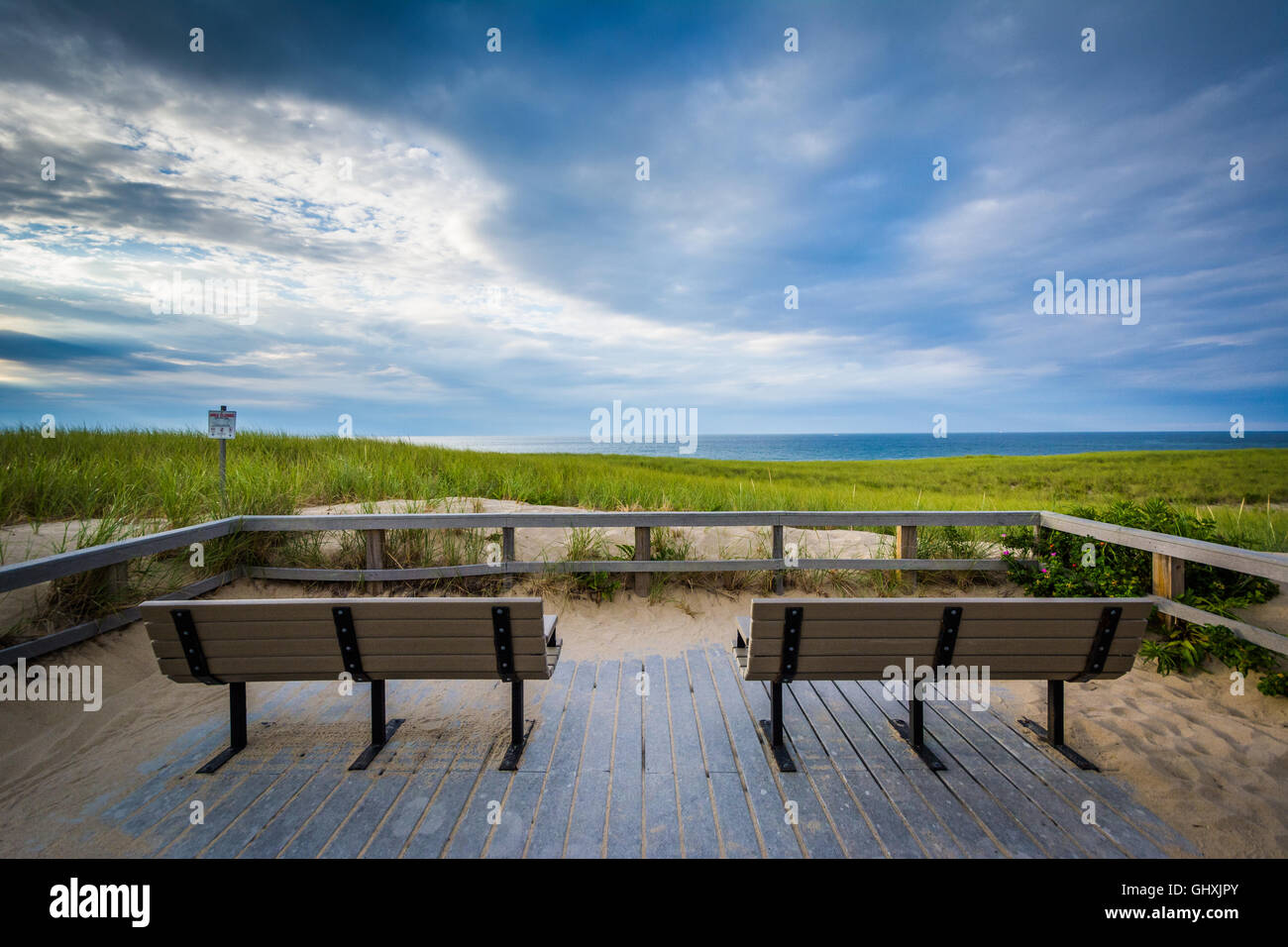 Benches and sand dunes at Race Point, in the Province Lands at Cape Cod National Seashore, Massachusetts. Stock Photo