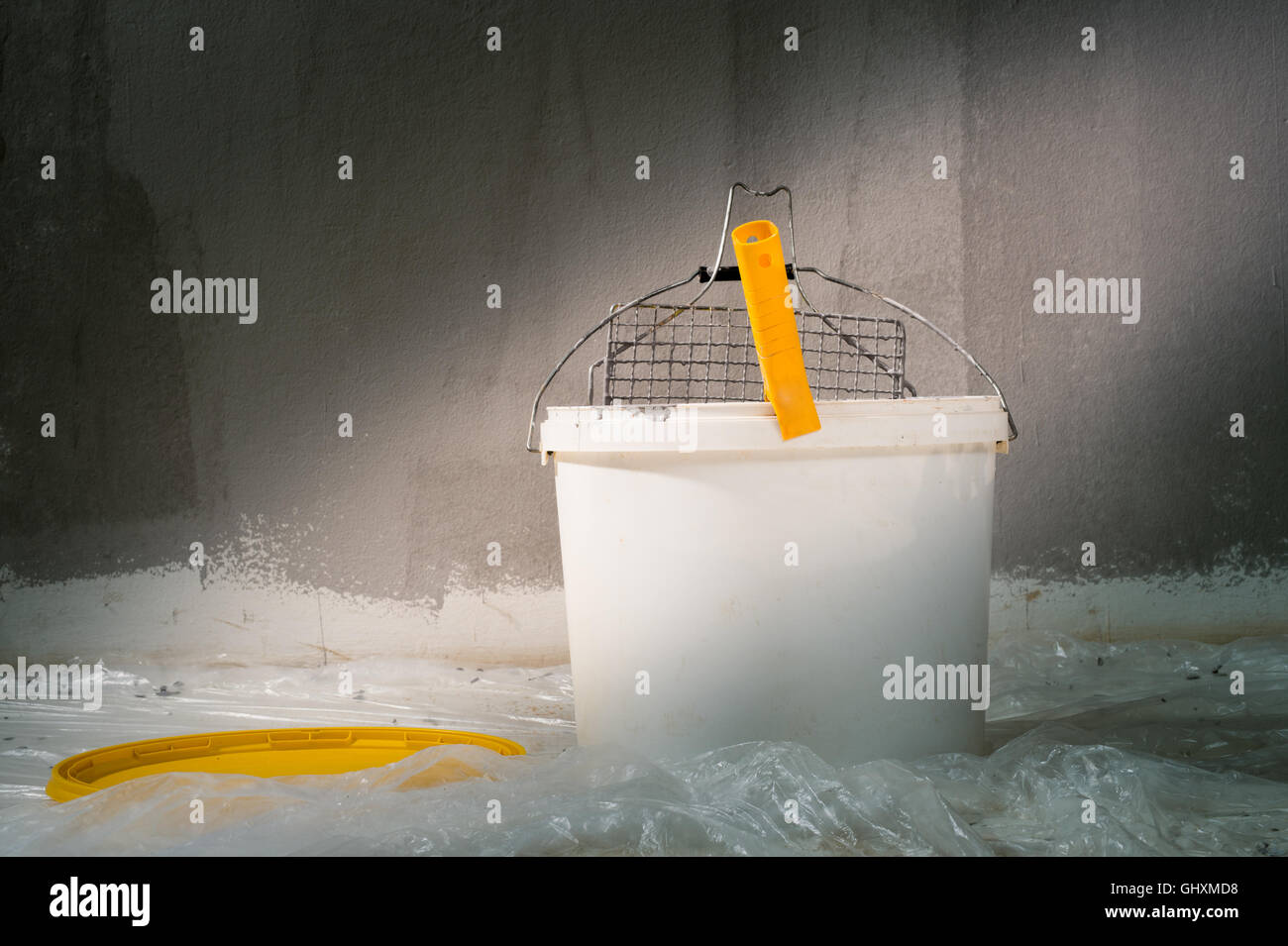 colouring the wall with roller Stock Photo