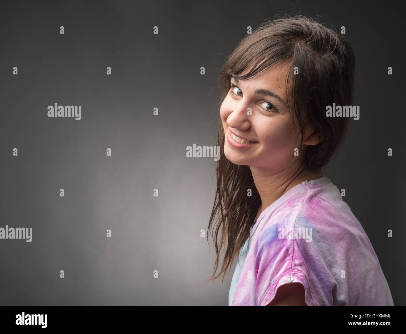 Portrait of a happy young woman Stock Photo - Alamy
