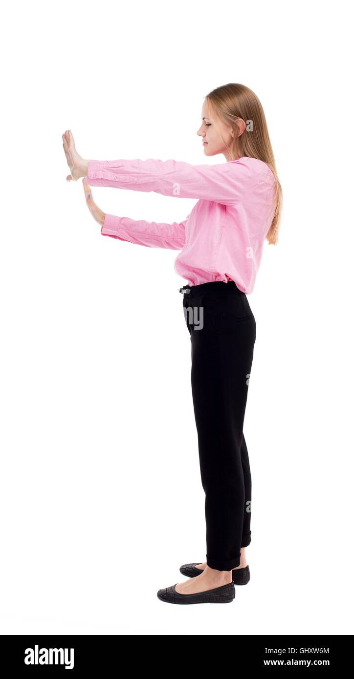 Pushing Back View back view of business woman pushes wall Stock Photo - Alamy