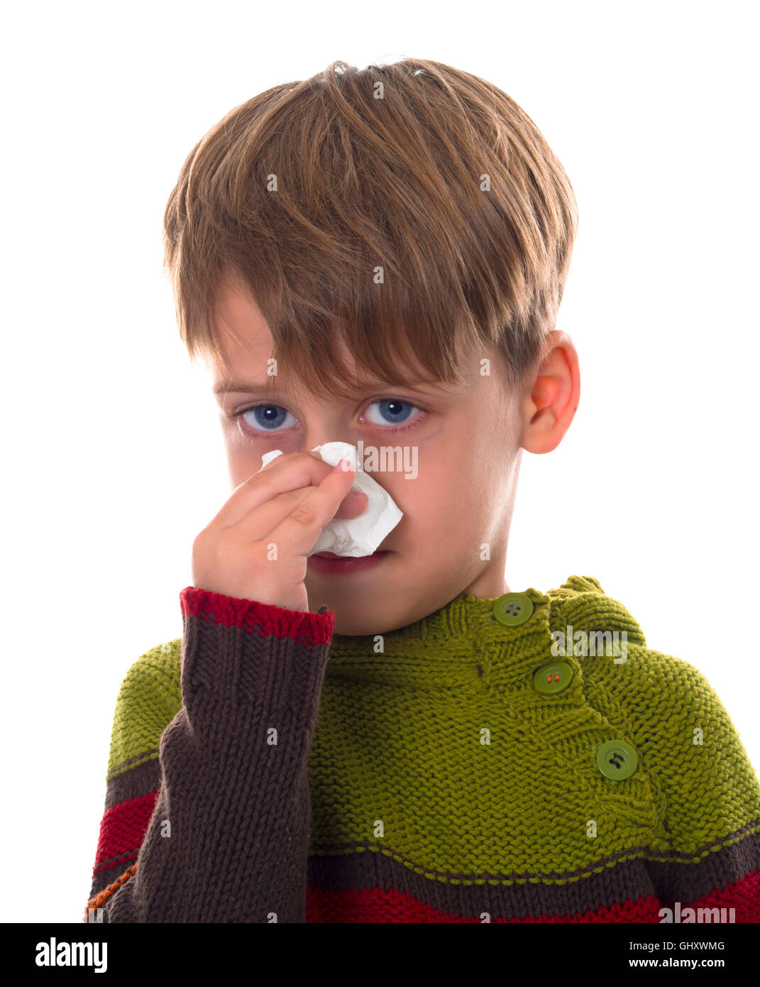boy wiping his nose Stock Photo