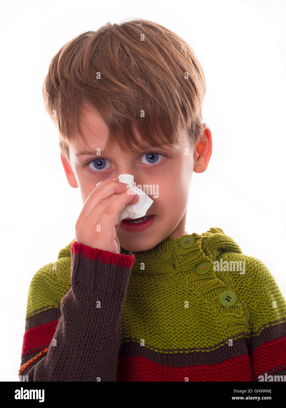 boy wiping his nose Stock Photo