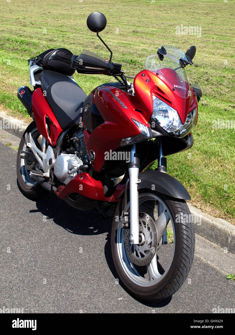 Honda Varadero 125 motorcycle in country, made in Japan Stock Photo - Alamy