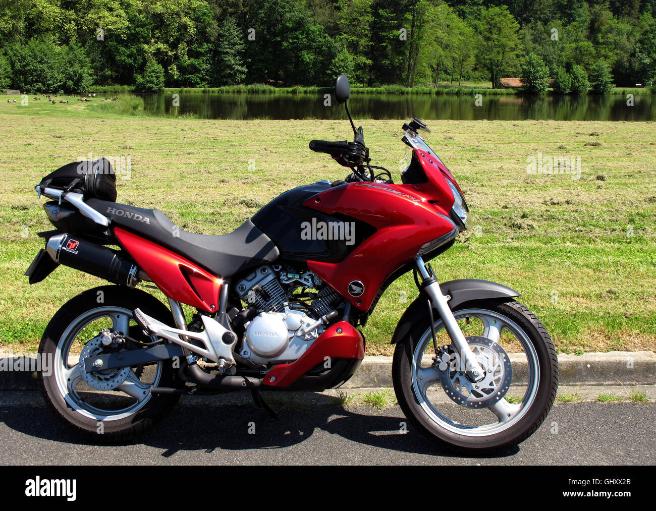 Honda Varadero 125 motorcycle in country, made in Japan Stock Photo - Alamy