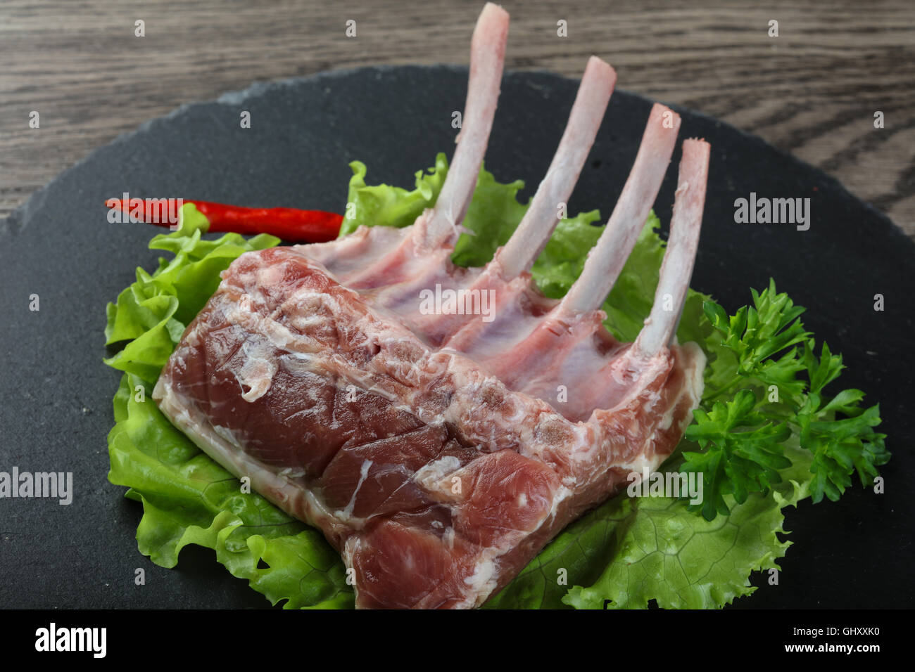 Lamb Frenched Rack 4 rib bone Stock Photo - Alamy