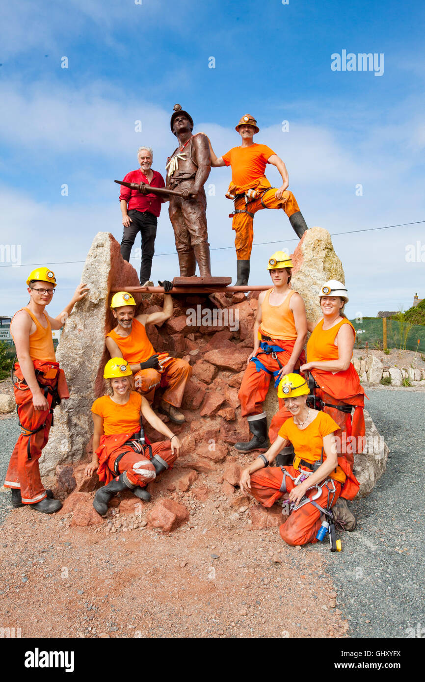 Man Engine team put garland of tallow candles round miner's neck Stock Photo