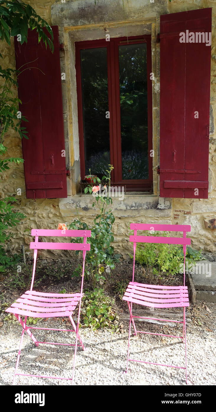 Window with red shutters rural France Stock Photo