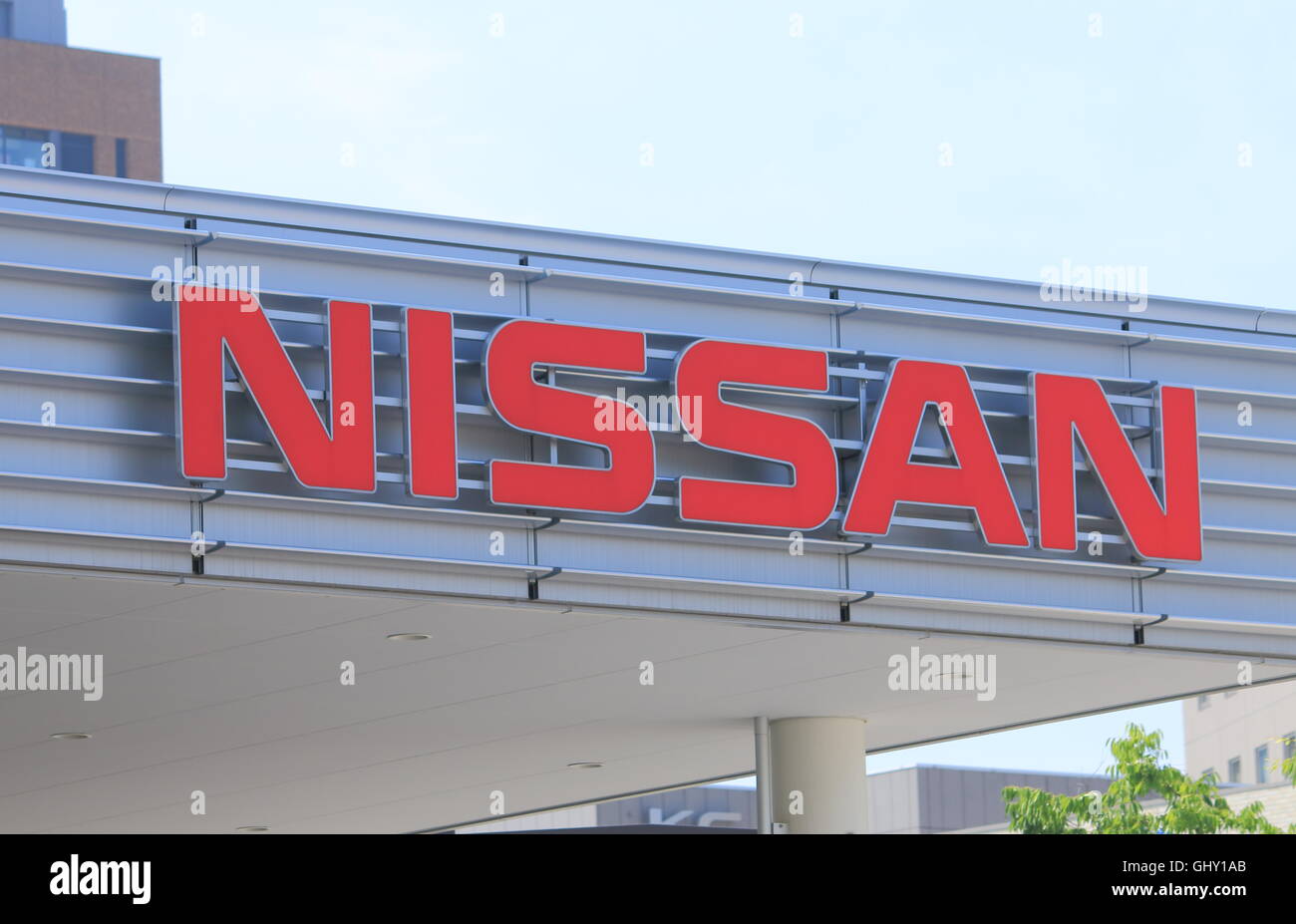 NISSAN company logo, Japanese car manufacturer and one of the biggest in Japan. Stock Photo