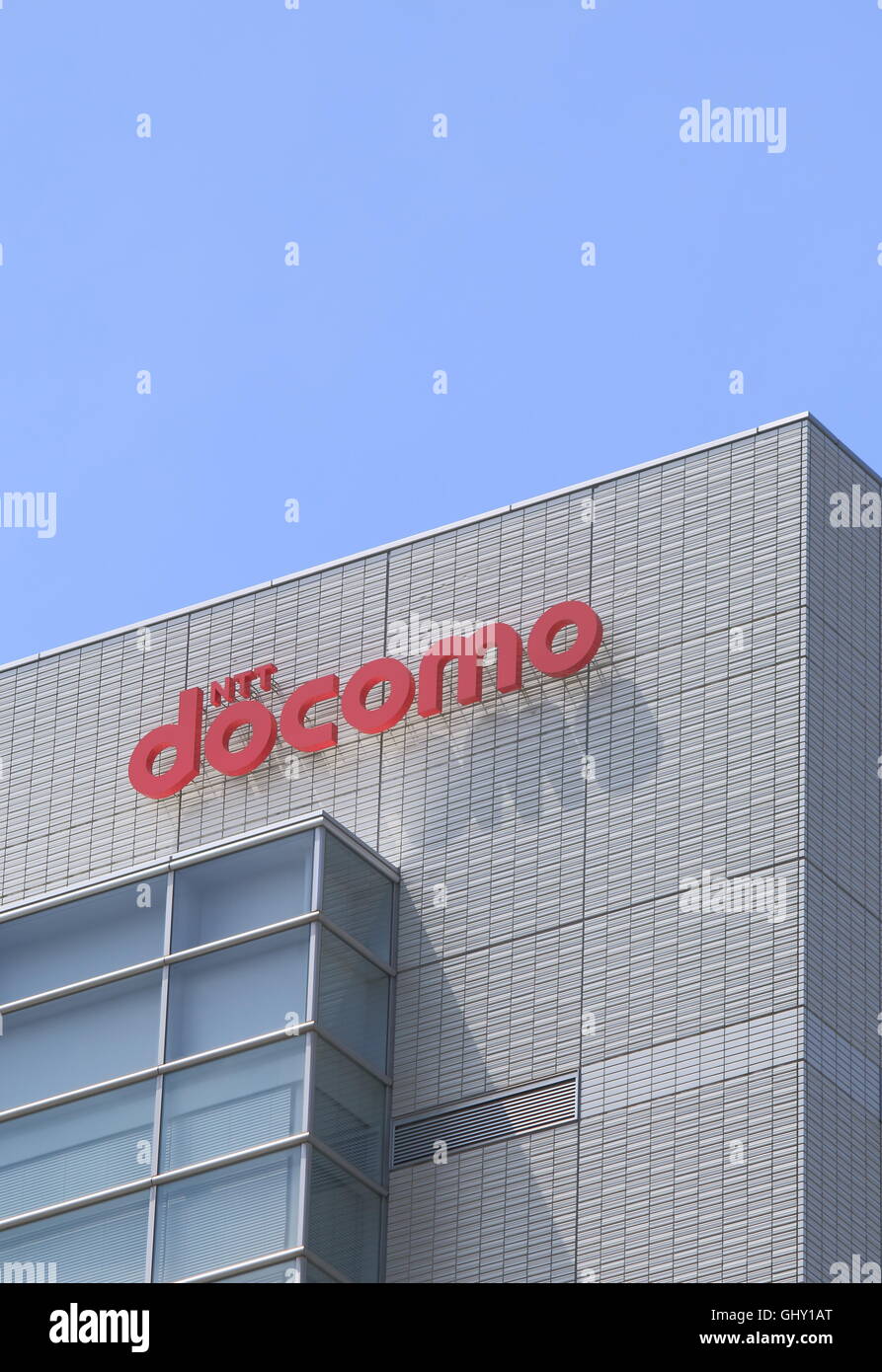 NTT Docomo company logo, the predominant mobile phone operator in Japan headquartered in Tokyo. Stock Photo