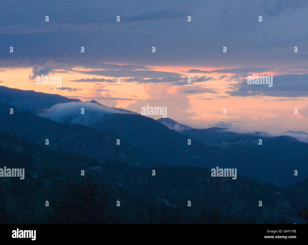 Fog lifts from Rocky Mountain foothills late in the day Stock Photo Alamy
