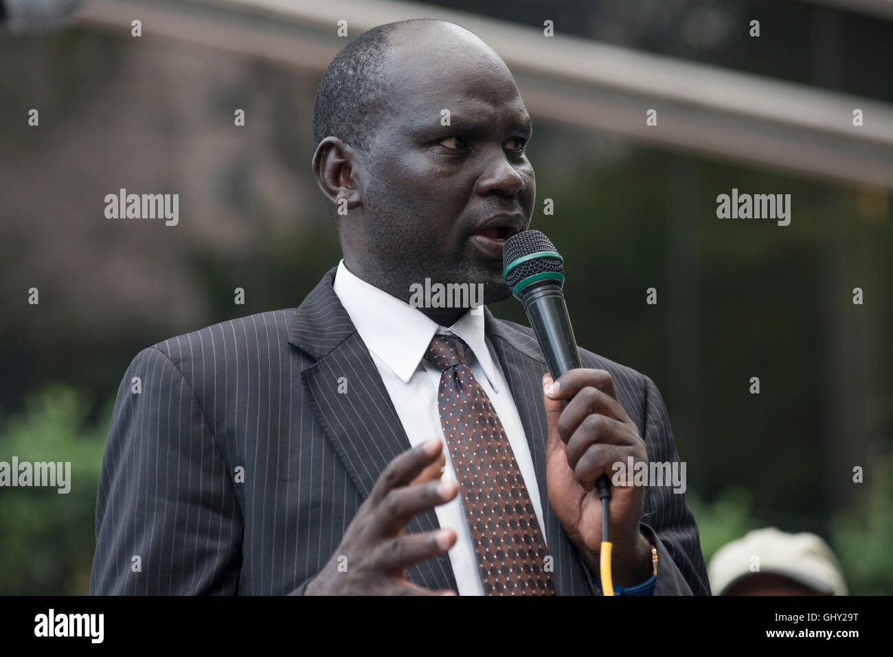 New York, USA. 11th August, 2016. SPLM-IO Representative to the United Nation Miyon Kuon speaks at the rally. Credit:  PACIFIC PRESS/Alamy Live News Stock Photo