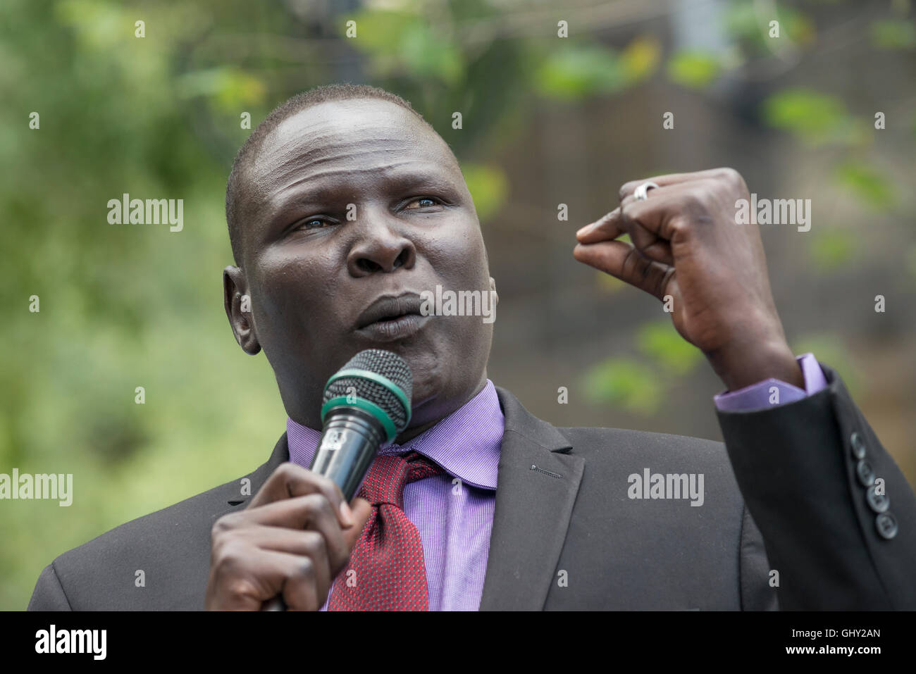 New York, USA. 11th August, 2016. SPLM-IO Representative for North America Reath Muoch Tang speaks at the rally. Credit:  PACIFIC PRESS/Alamy Live News Stock Photo