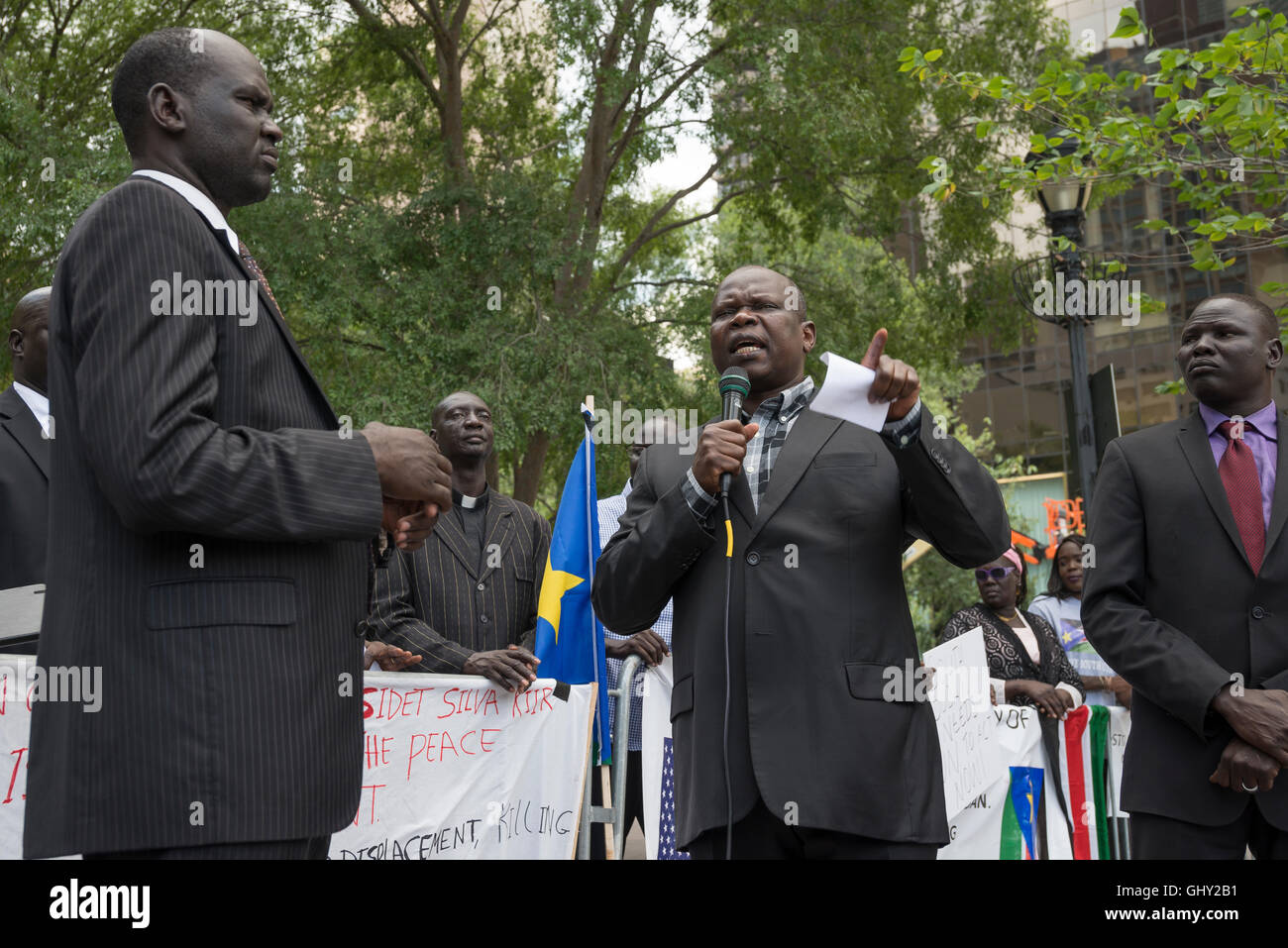New York, USA. 11th August, 2016. Pagan Amum (center), former Secretary General of the ruling Sudan People's Liberation Movement (SPLM) and now leader of the SPLM-Former Detainees faction, speaks at the rally. Credit:  PACIFIC PRESS/Alamy Live News Stock Photo