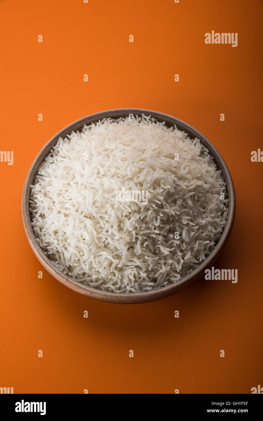basmati rice in a brass bowl, cooked basmati rice, cooked plain rice