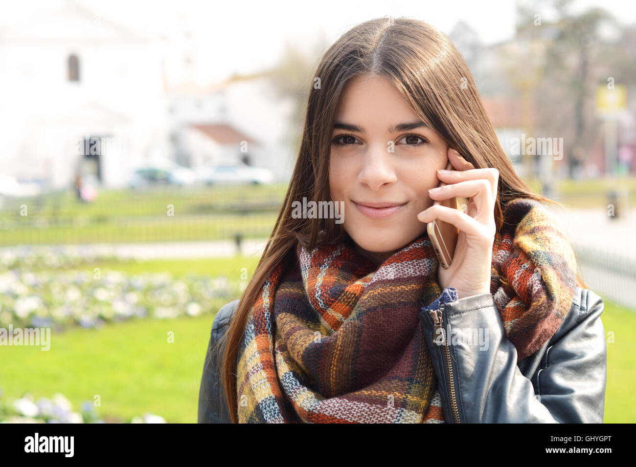 Portrait of a young beautiful woman outdoors Stock Photo - Alamy