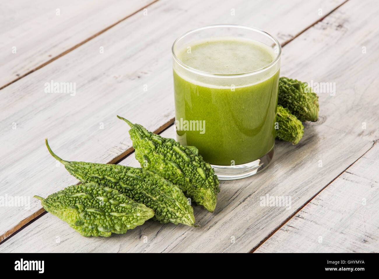 Herbal Juice Of Green Momodica In A Glass With Sliced Vegetables Karela Juice Or Bitter Gourd Juice Stock Photo Alamy