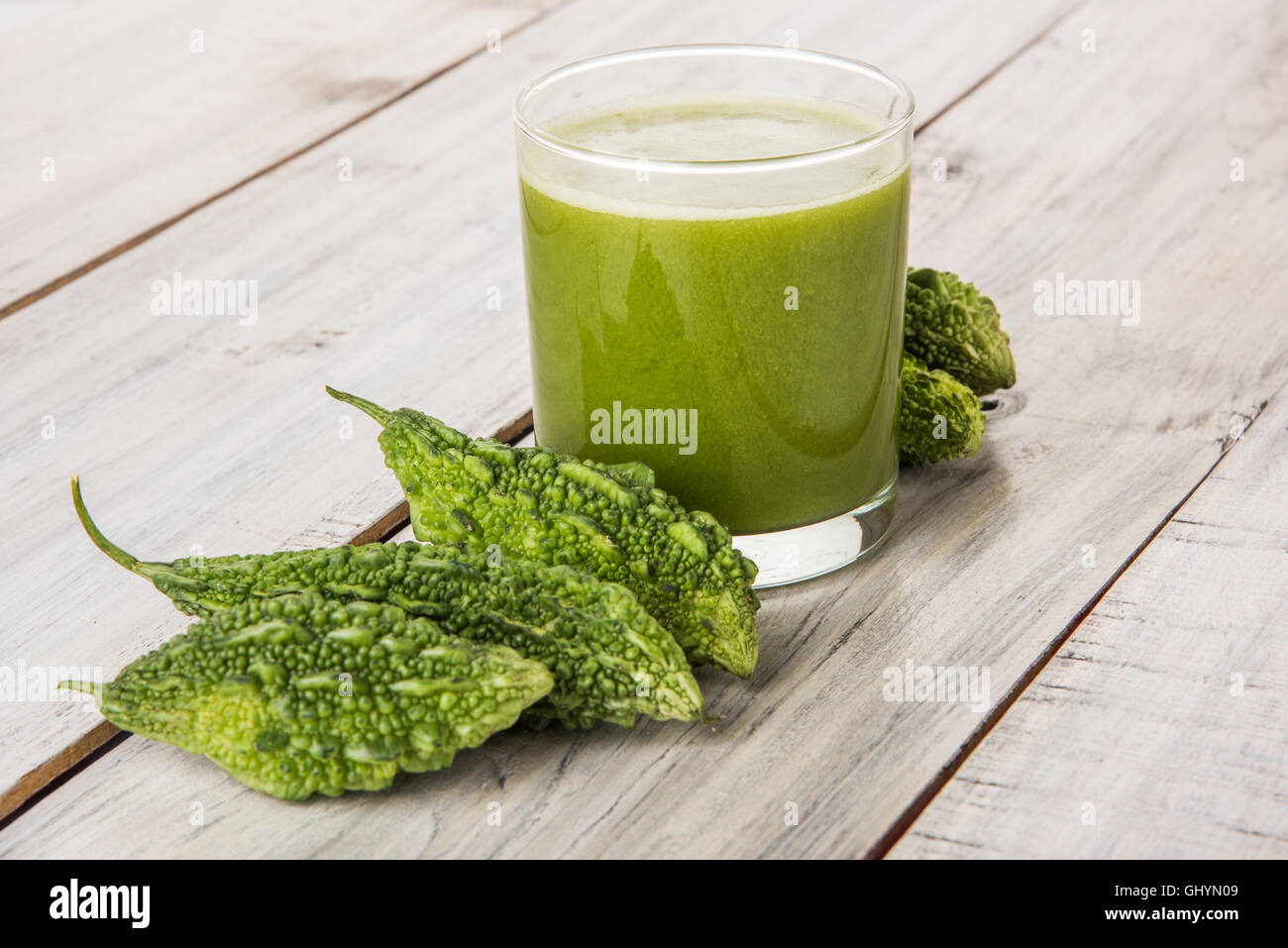 Herbal Juice Of Green Momodica In A Glass With Sliced Vegetables Karela Juice Or Bitter Gourd Juice Stock Photo Alamy