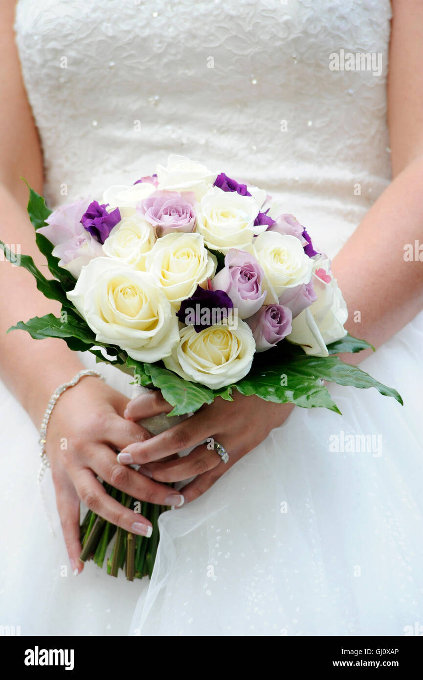 Bride holding wedding  bouquet Stock Photo
