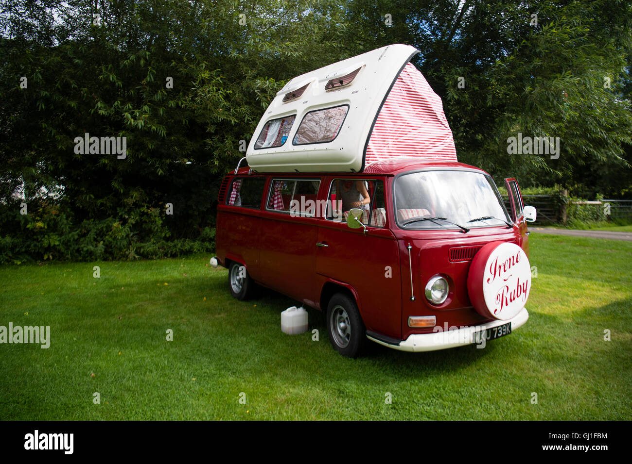 A classic 1972 T2 type 2 VW Volkswagen microbus motor home campervan  on a campsite UK Stock Photo