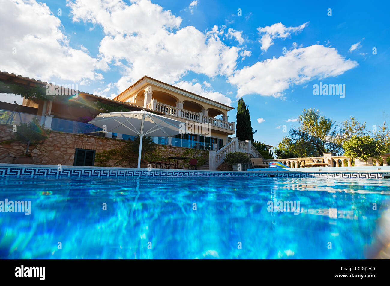 View of the typical Spanish house from the pool, Mallorca Stock Photo