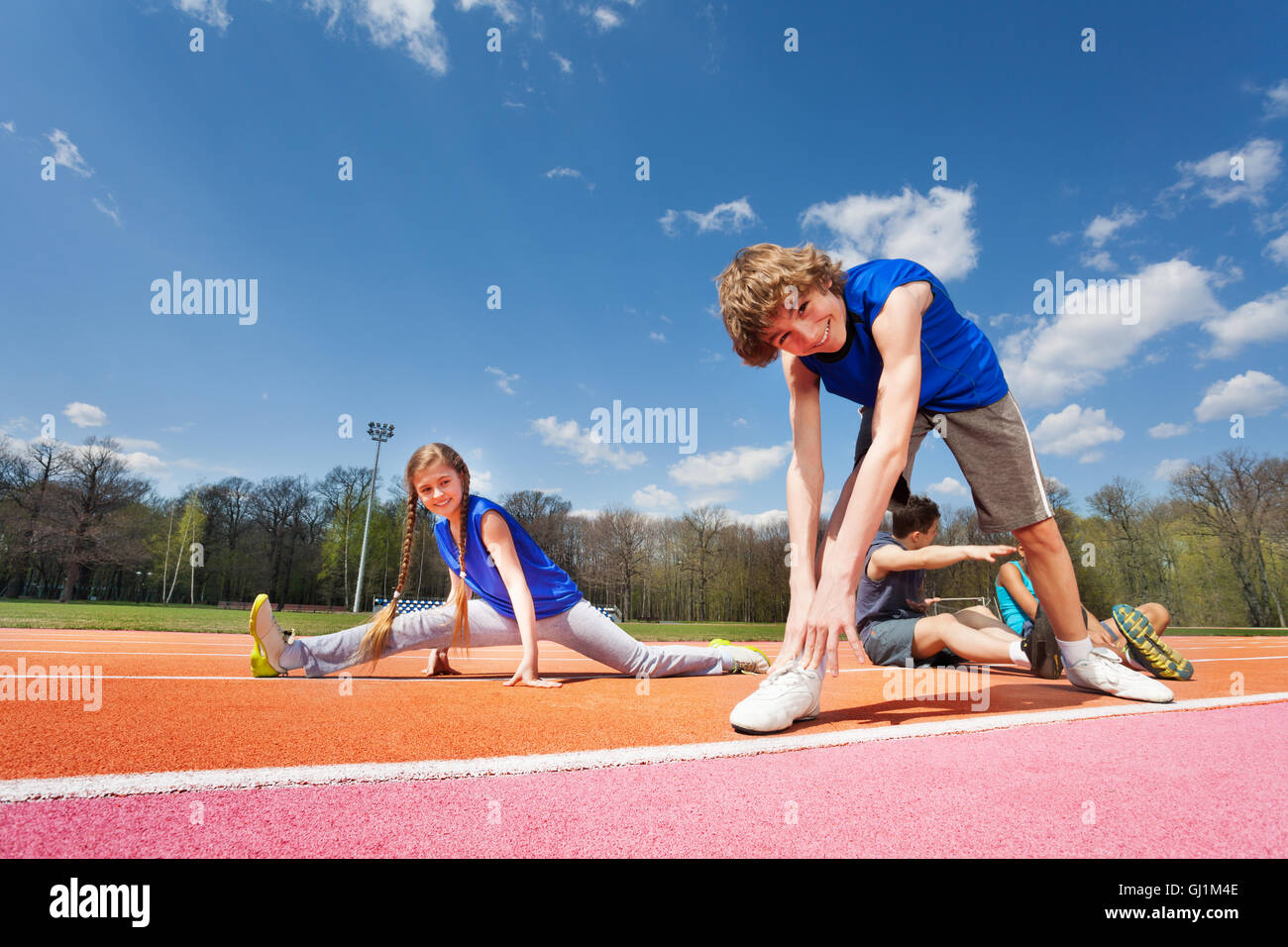 Young Stretch Routine Teenage kids stretching before exercises Stock Photo - Alamy