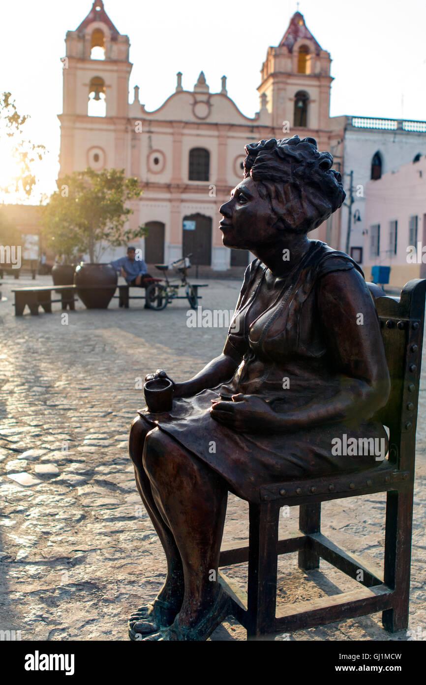 Cuba, Camaguey, Camaguey Province, Plaza Del Carmen, Iglesia de Nuestra Senora del Carmen and Unique life-sized sculptures Stock Photo