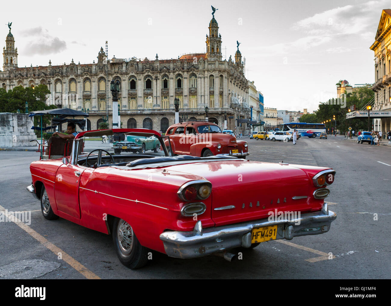 Vintage red car, rear view, in busy street , Havana, Cuba, 2013. Stock Photo