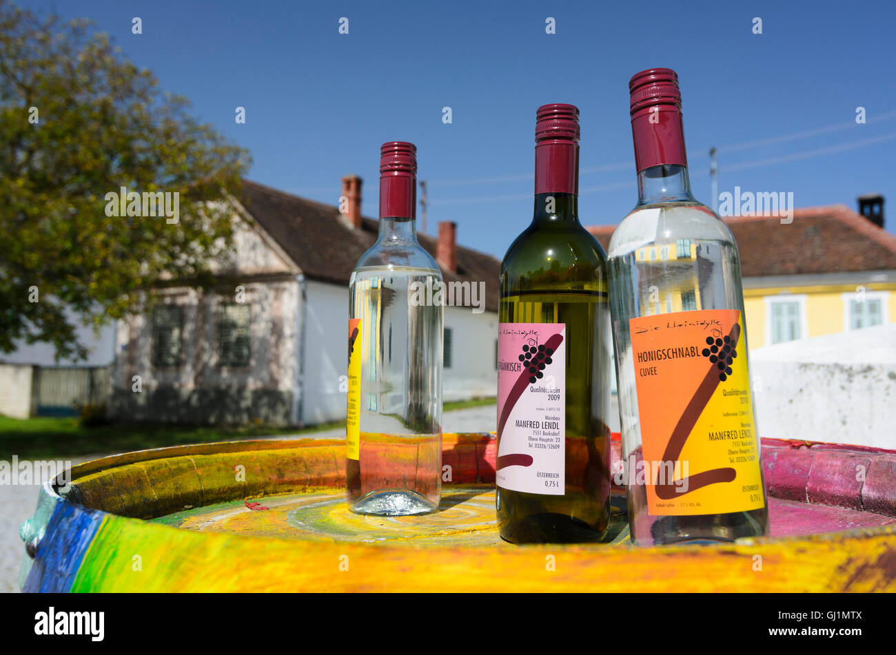 Wine bottles in front of winery, Austria, Burgenland, Bildein Stock Photo