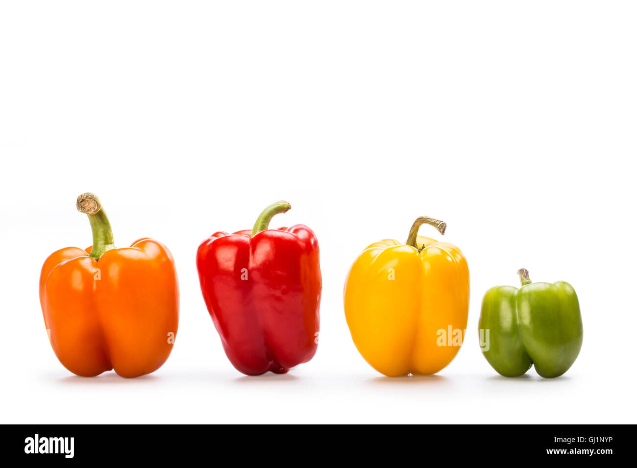 Yellow, red, orange and green paprika Stock Photo