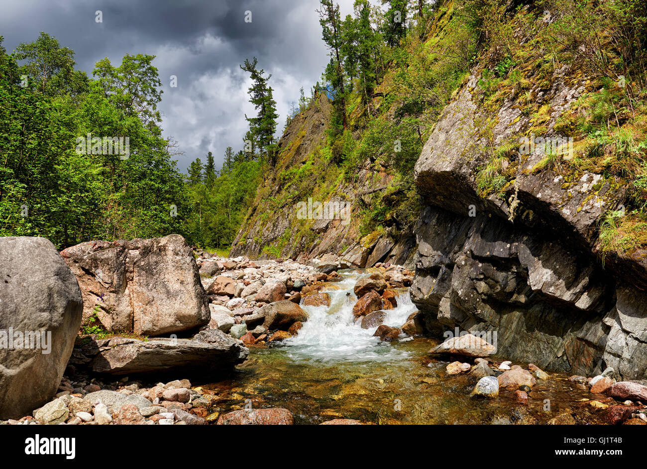 Mountain stream in small rock. Eastern Sayan . Russia Stock Photo