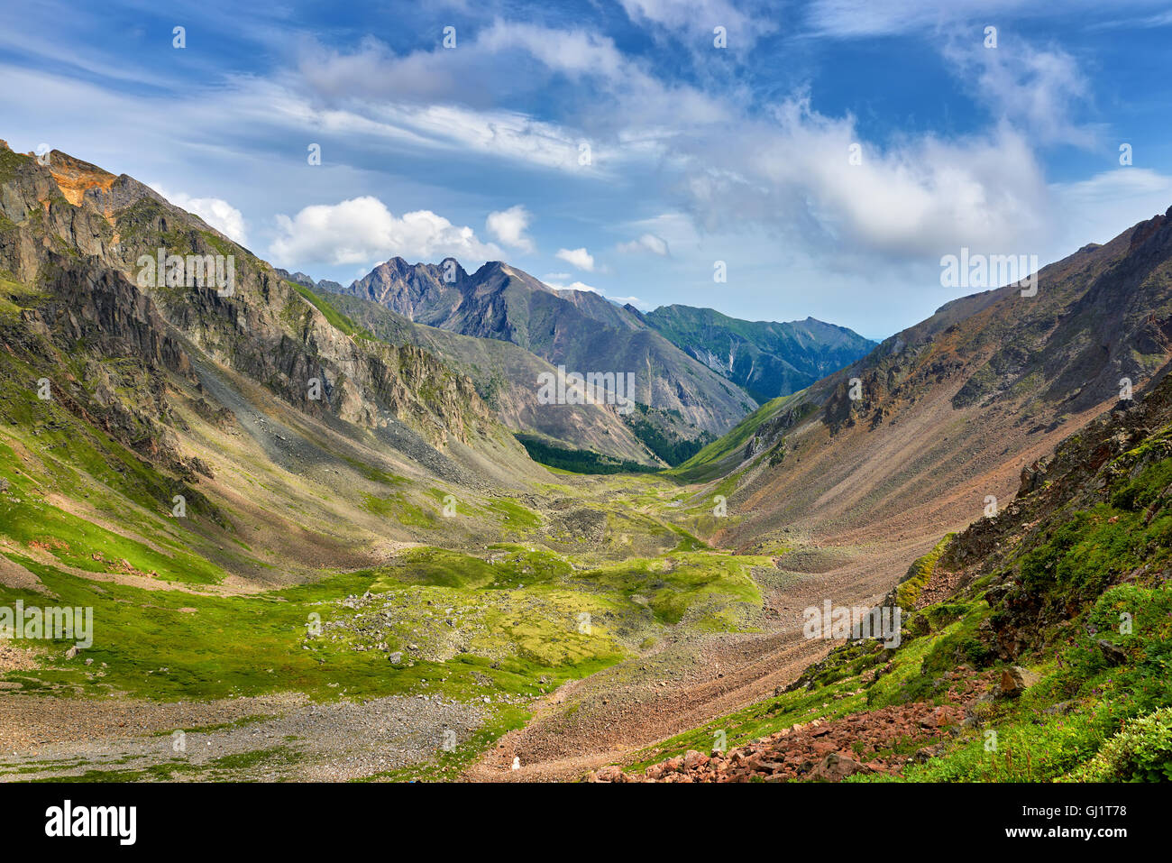Green alpine meadows in mountain valley . View from above. Eastern Sayan . Russia Stock Photo