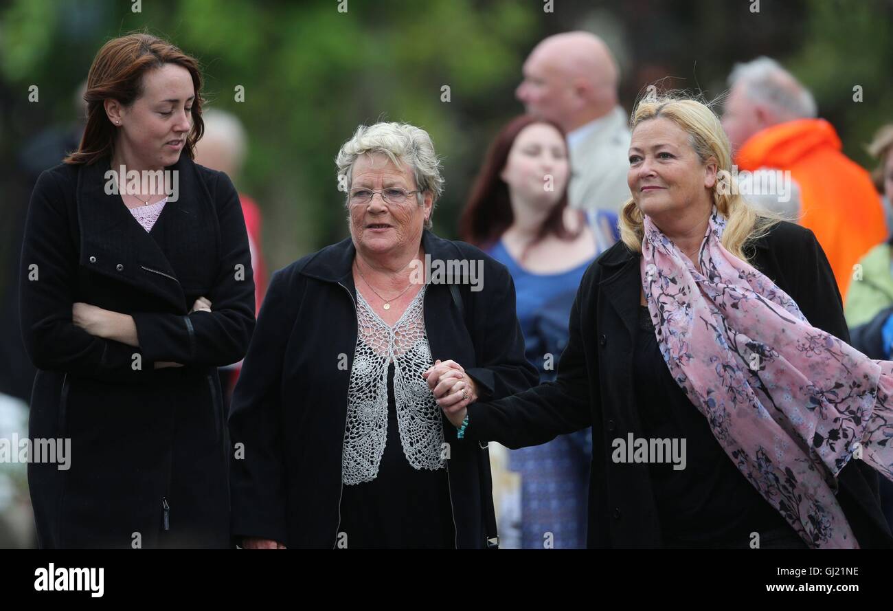 Kay Duddy (centre), sister of Bloody Sunday victim Jackie Duddy, attends the funeral of Dr Edward Daly at St Eugene's Cathedral in Londonderry. Stock Photo