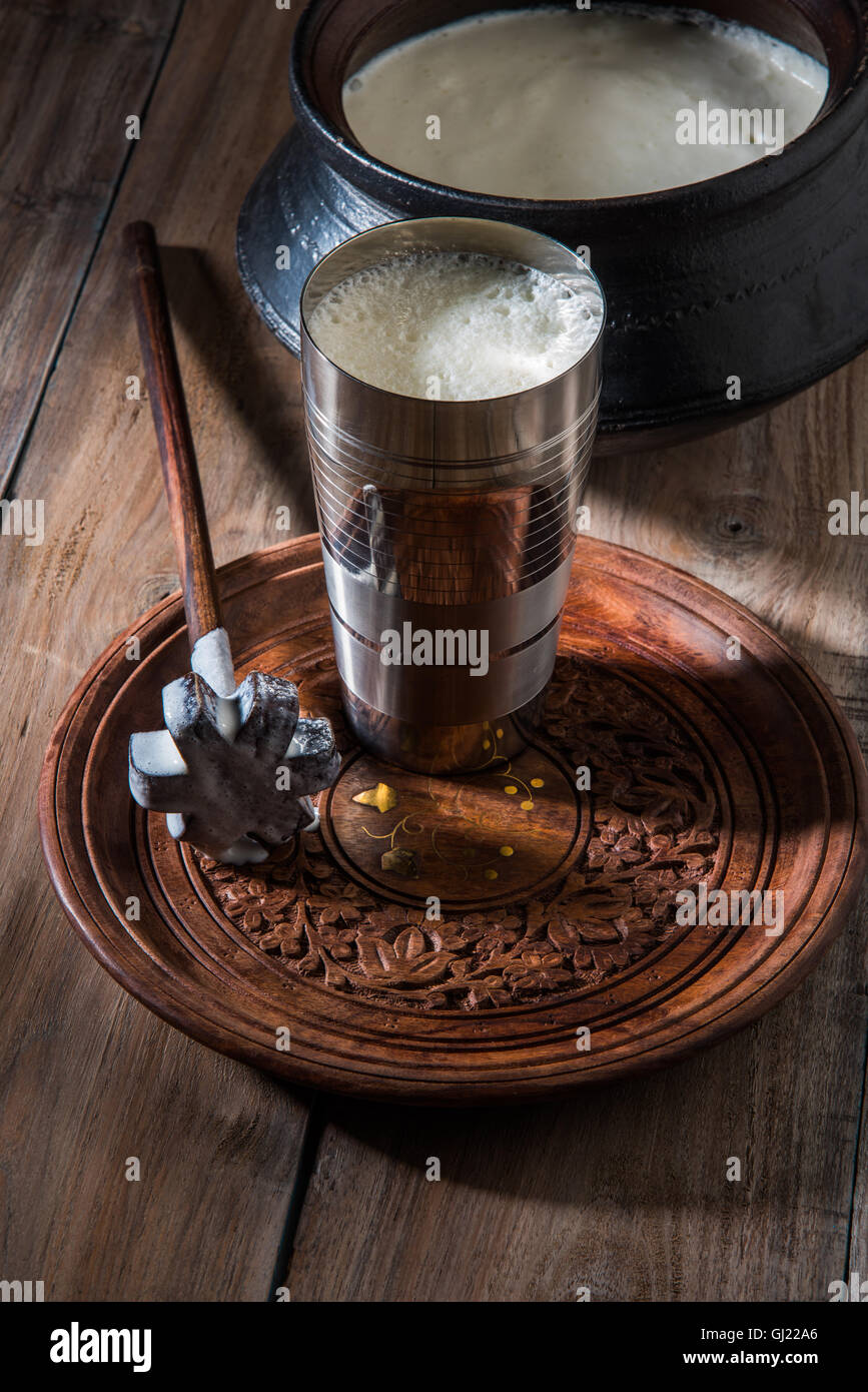 Indian sweet Lassi made up of milk, curd, sugar and salt mixed with ice ...