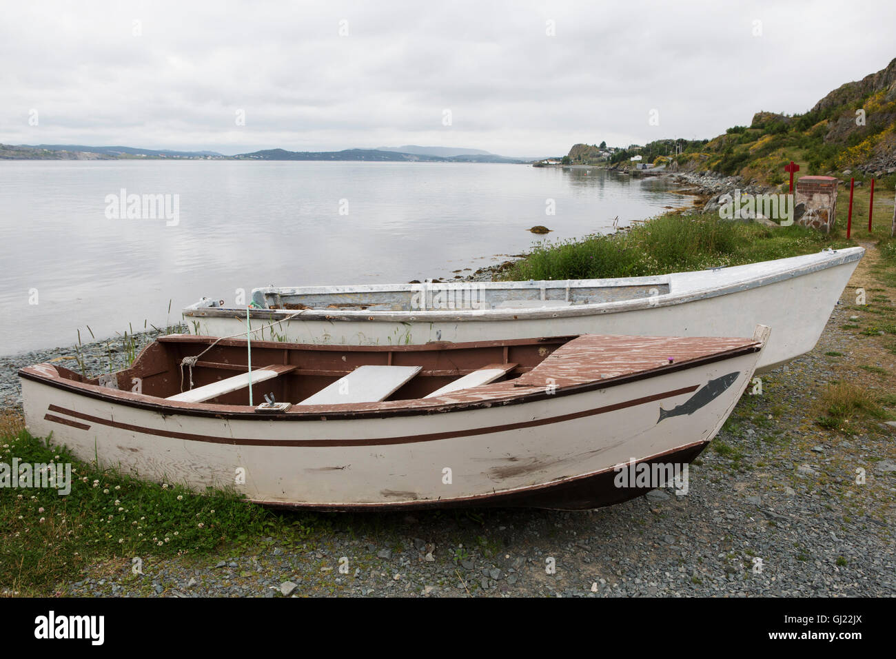 Wooden rowing boats on the shore at Bay Roberts in Newfoundland and Labrador, Canada. Stock Photo