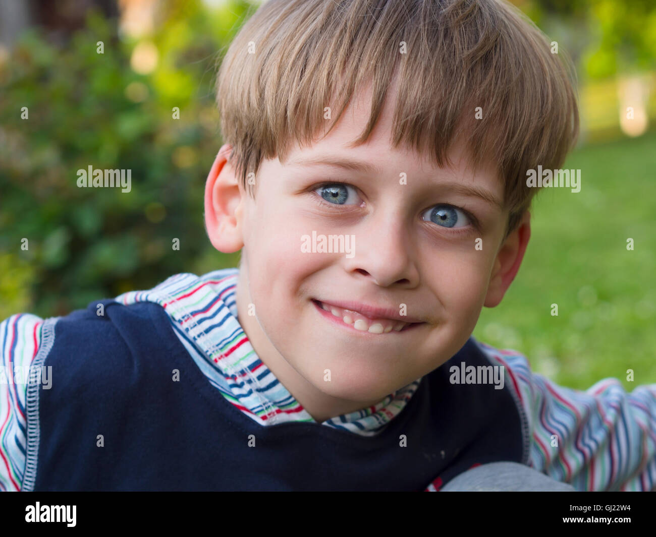 portrait of a cute boy in the nature Stock Photo