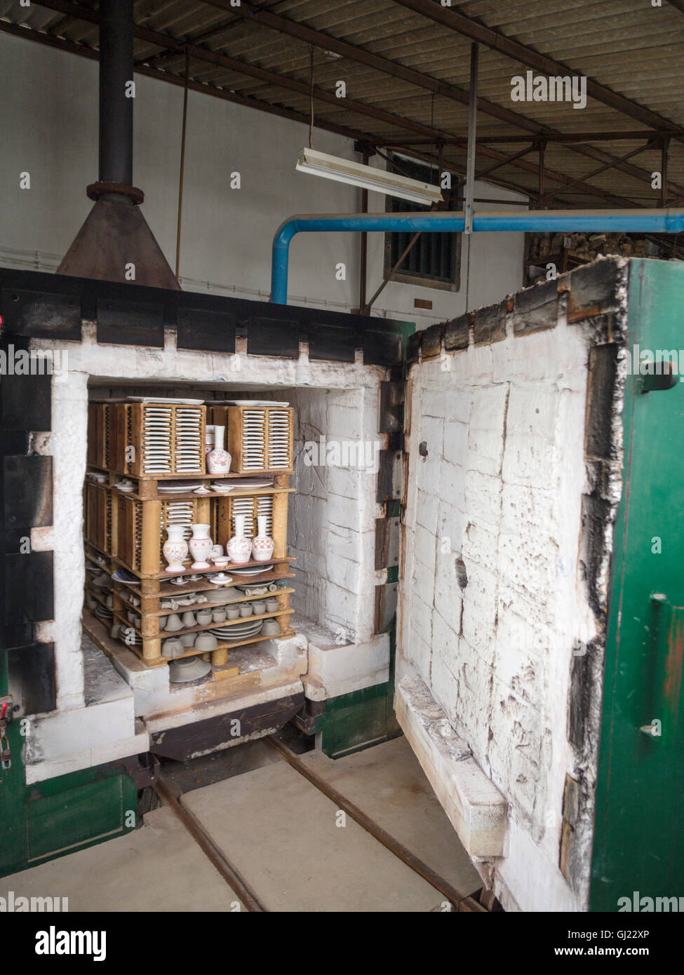 Pottery Furnace/Kiln filled with items to be fired. A batch of pottery