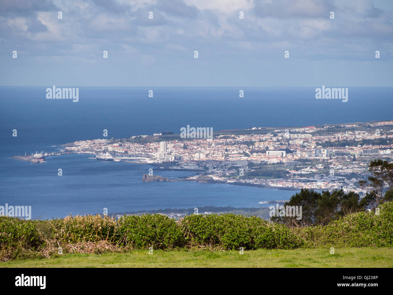 Ponta Delgada from above. The port and skyline of the Azores capital from a hill high above the city. Stock Photo