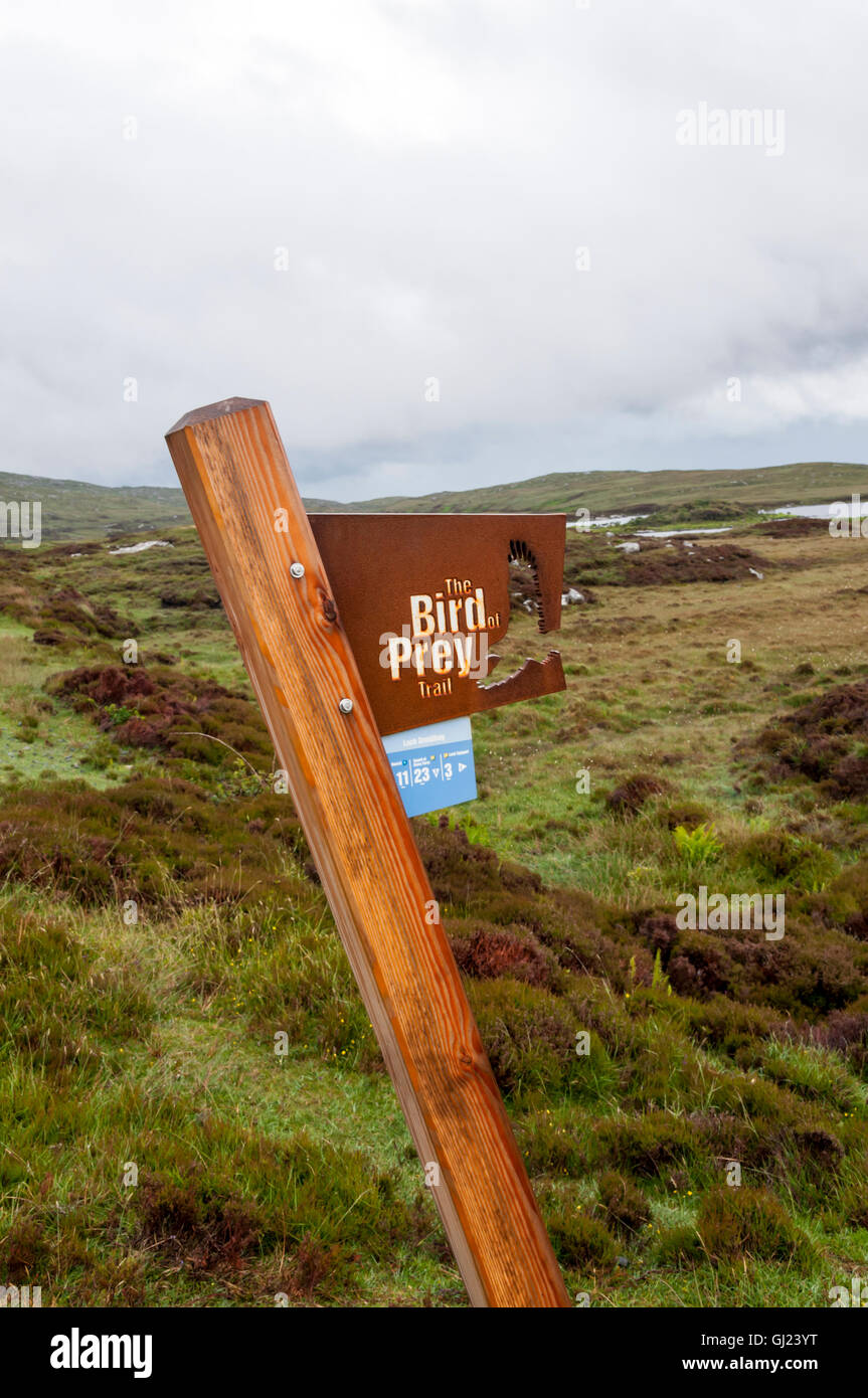 A sign for the Bird of Prey Trail at Loch Druidibeg on South Uist in the Outer Hebrides. Stock Photo