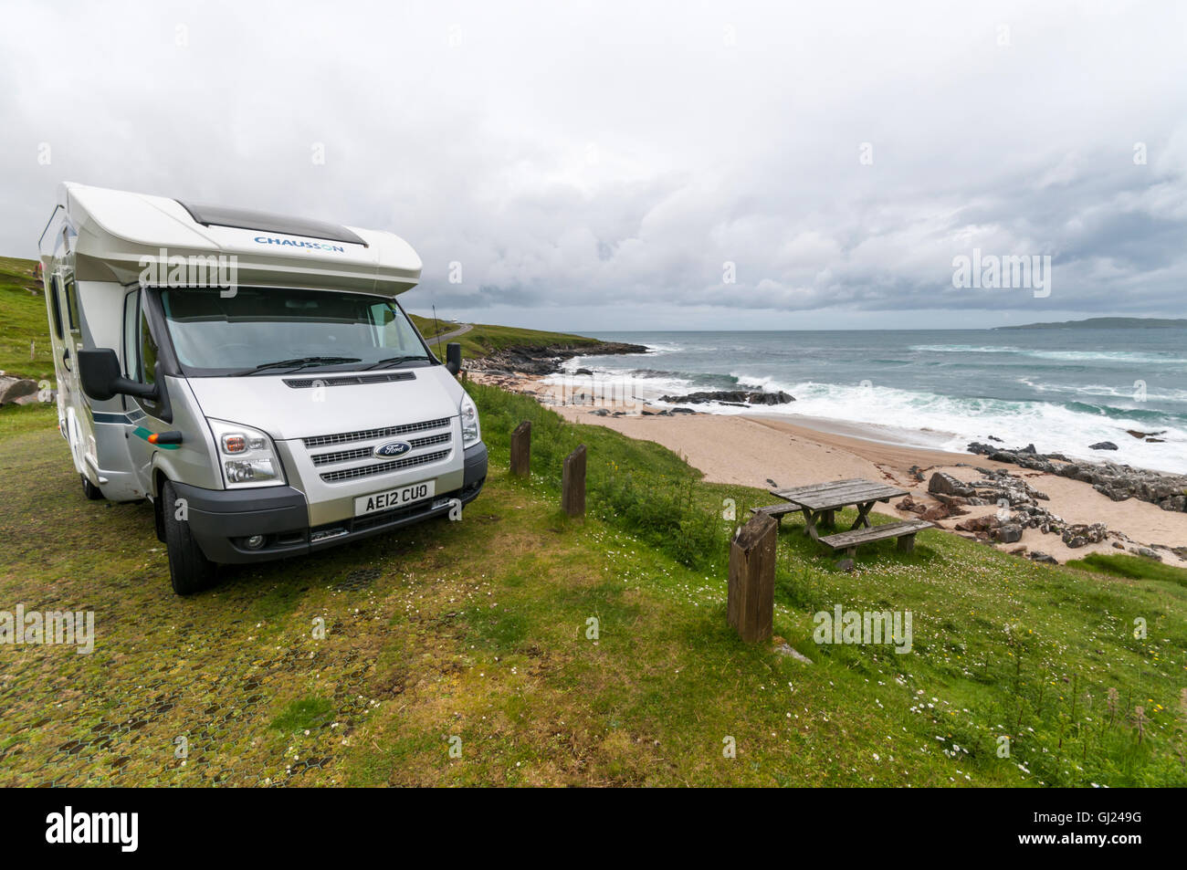 A Ford Chausson motorhome parked at the Sgarastadh Mhor picnic area on South Harris in the Outer Hebrides. Stock Photo