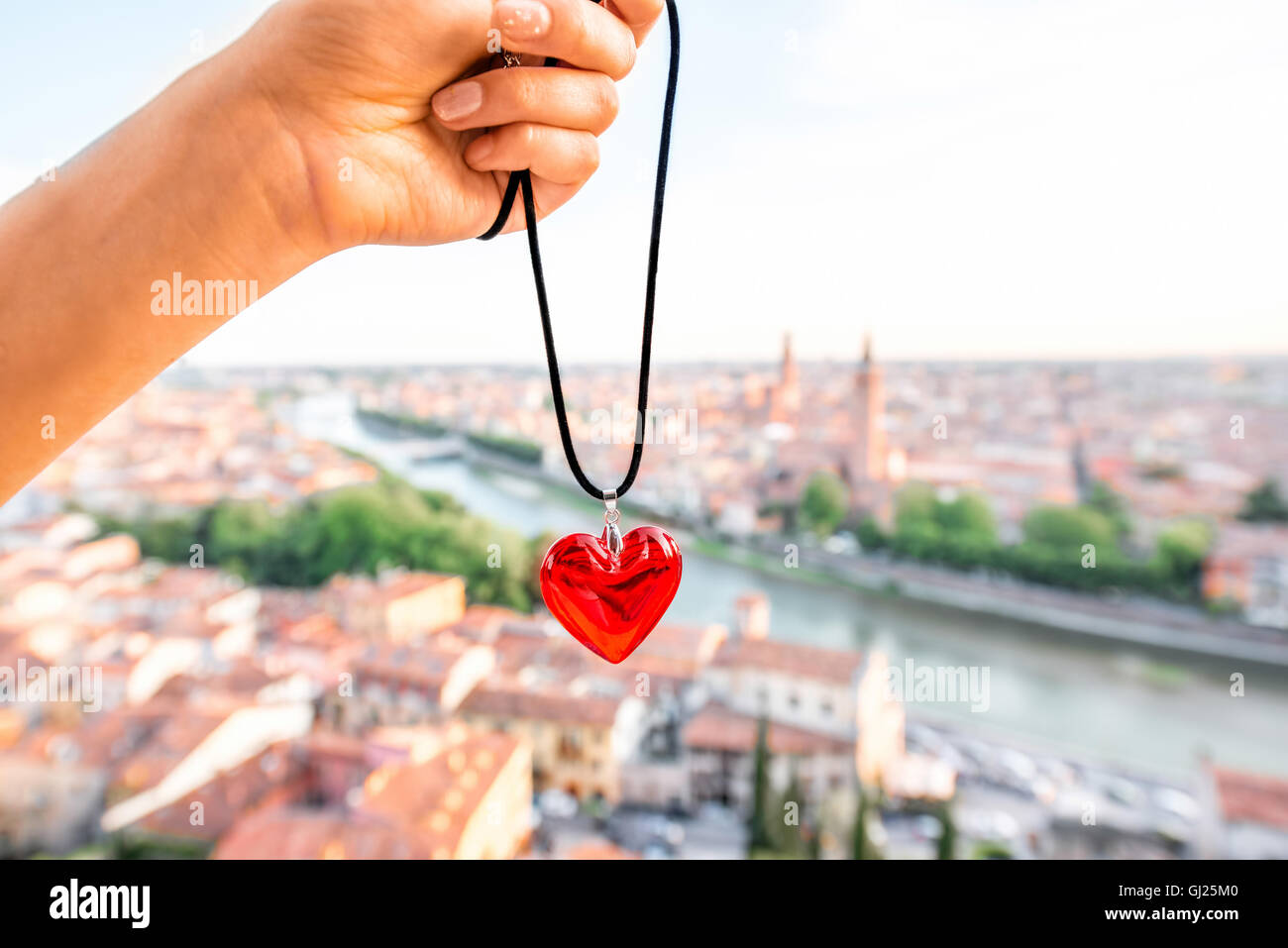 Heart on the Verona cityscape background Stock Photo - Alamy