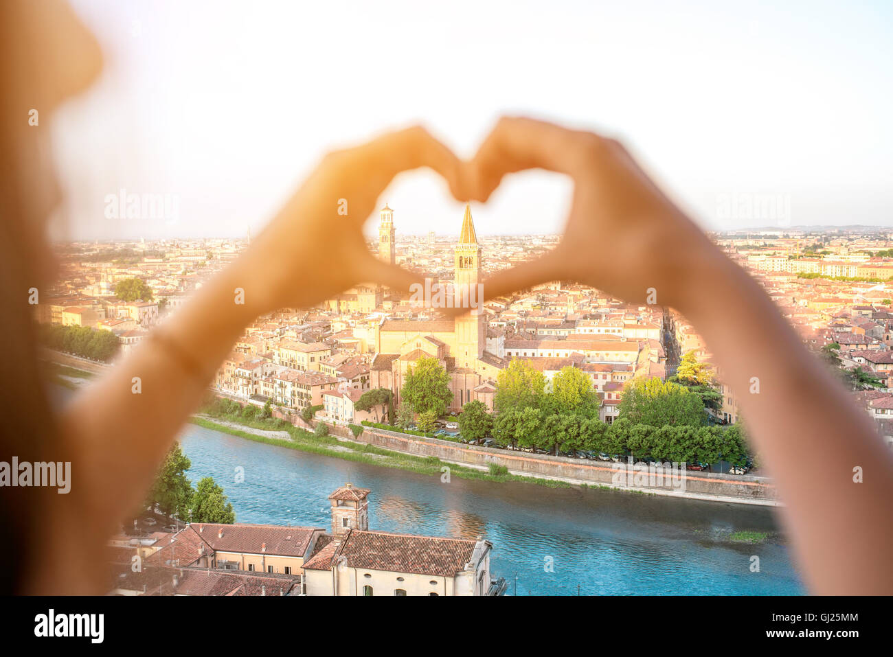 Heart shape on Verona cityscape background Stock Photo - Alamy