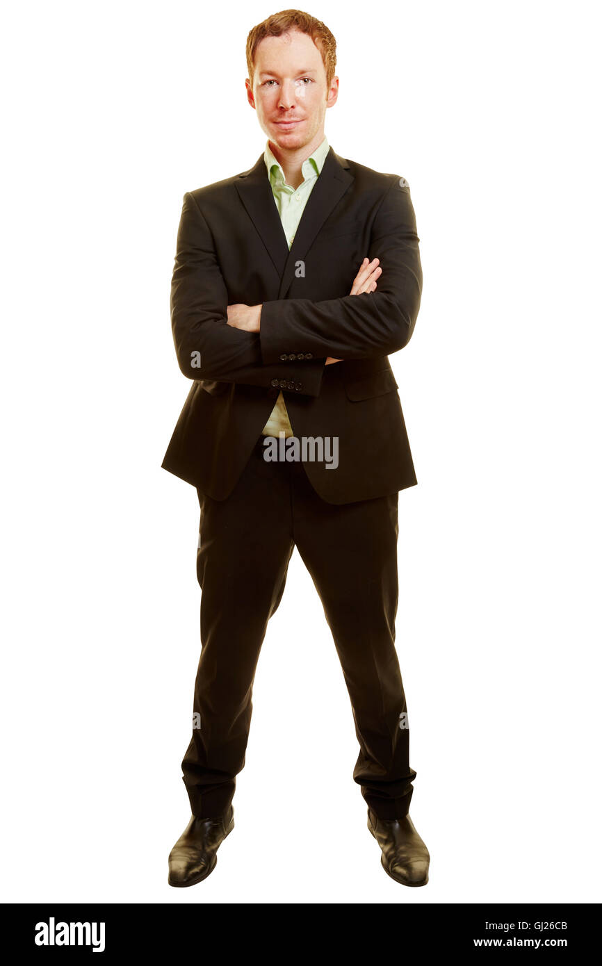 Businessman standing with crossed arms on a white background Stock ...