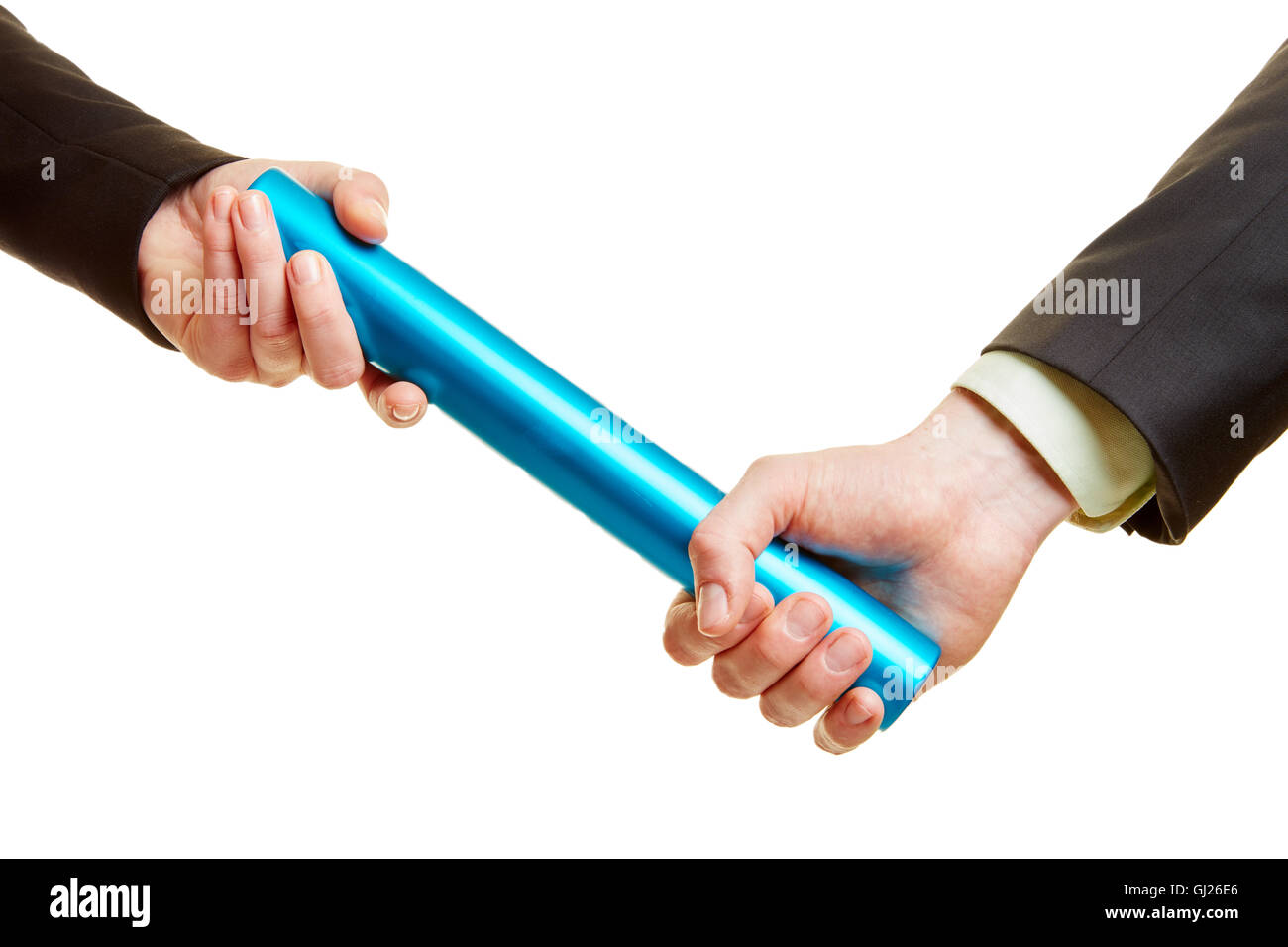 Two hands holding a baton as a team work concept Stock Photo