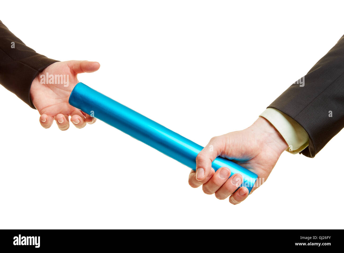 Team work concept with baton and two hands passing it by Stock Photo