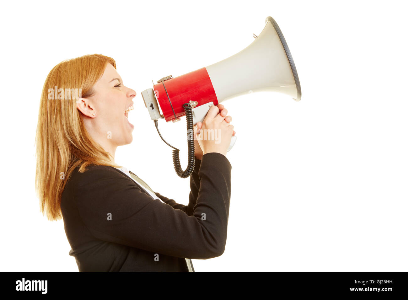 Businesswoman screaming on a megaphone on a white background Stock Photo