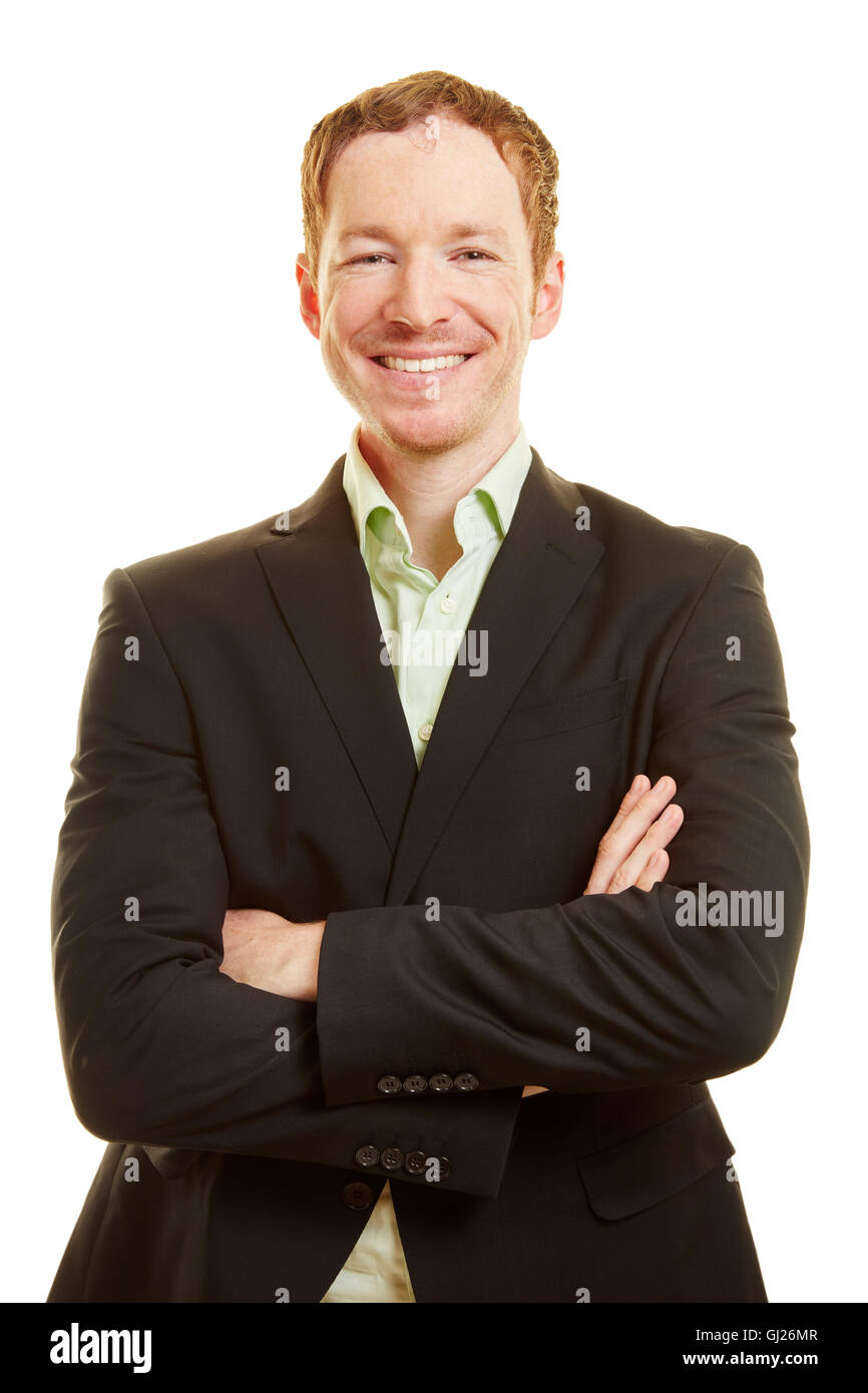 Smiling successful businessman with his arms crossed Stock Photo - Alamy