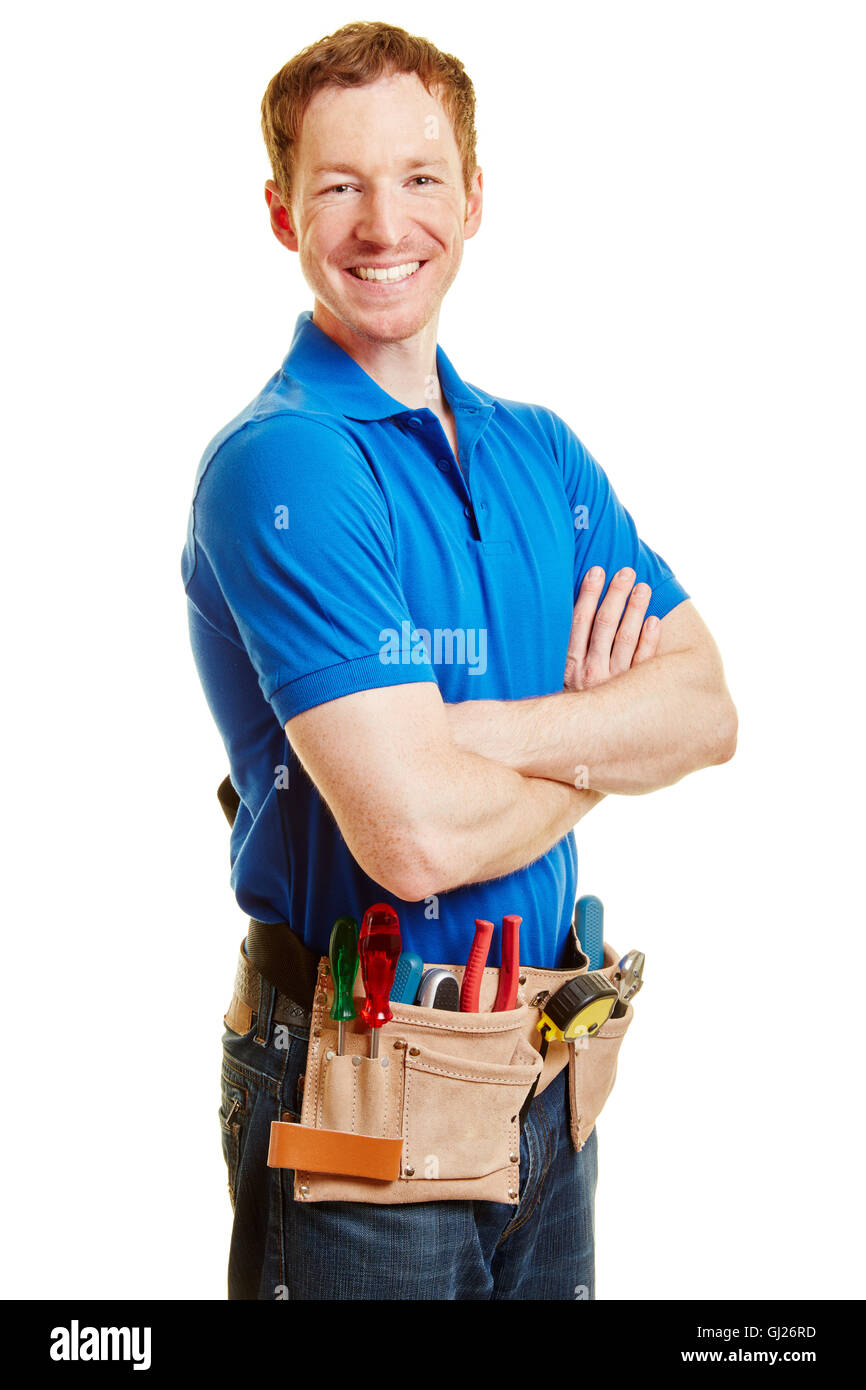 Man as a handyman or artisan smiling with his arms crossed Stock Photo
