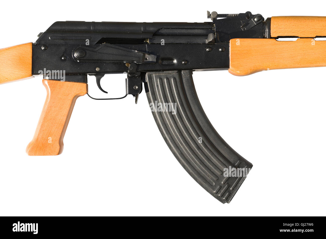 A detail of an AK-47 (Avtomat Kalashnikova) Kalashnikov assault rife on white. A clipping path is included for easy isolation. Stock Photo